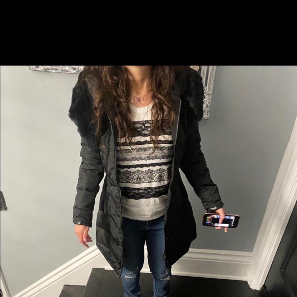 Black quilted down jacket with fur hood